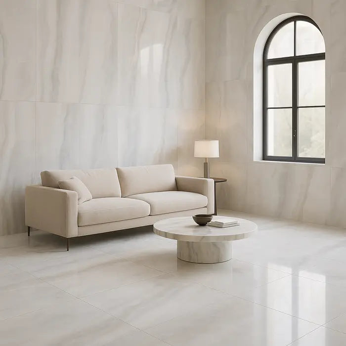 Akoya Silver Polished 24 x 48 porcelain tiles in living room.