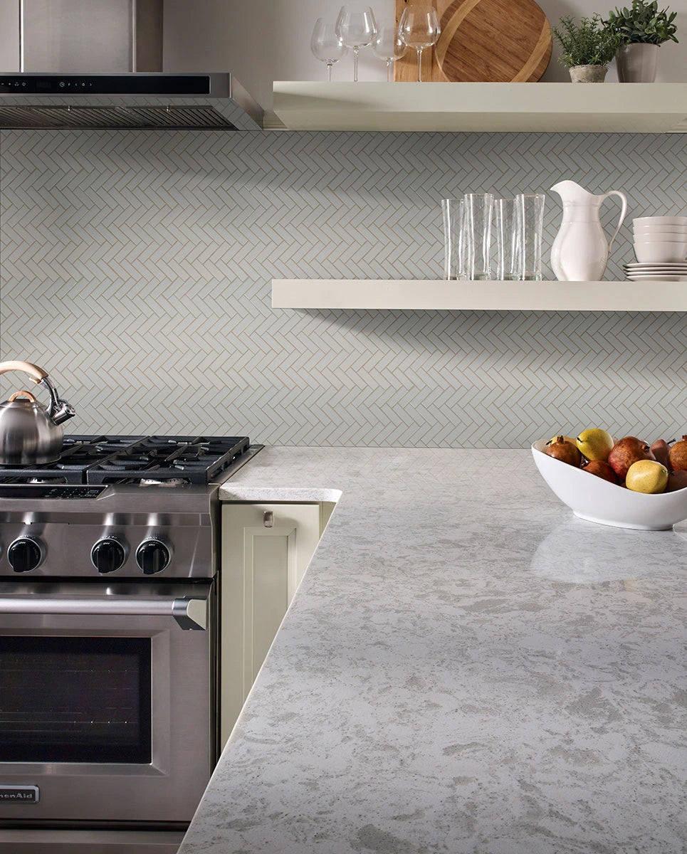 Gray Glossy Herringbone Tile backsplash in kitchen
