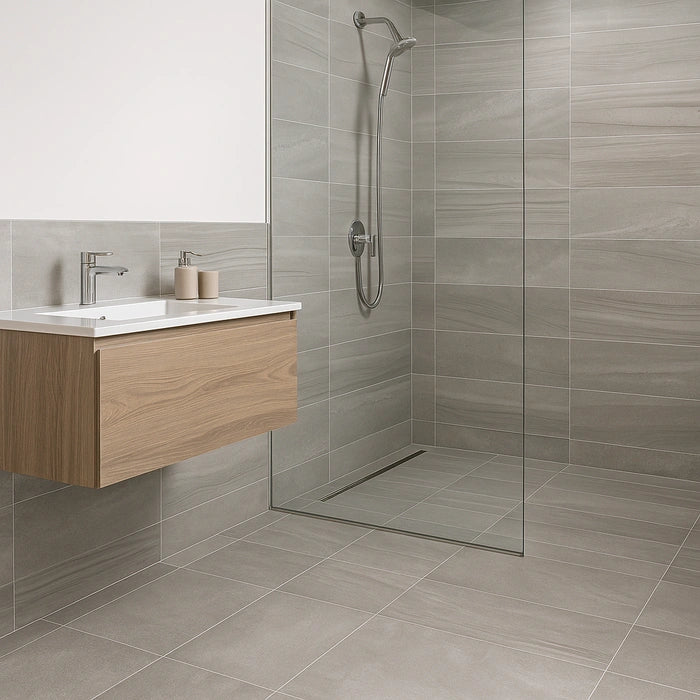 Artwork Platino 24 x 48 porcelain tiles in bathroom.