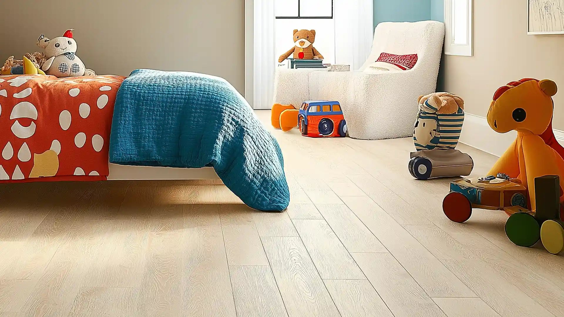 Kids’ bedroom with oak wood-look flooring, colorful quilt, and plush toys scattered on the floor.