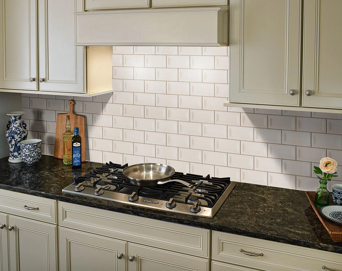 Almond Glossy Inverted Beveled Tile 3x6 backsplash in kitchen