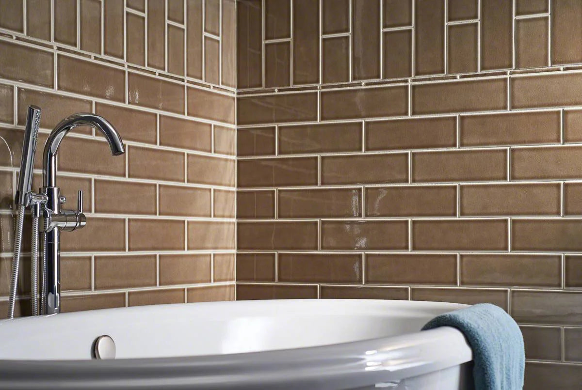 Artisan Taupe Glazed Handcrafted 4x12 Subway Tile with Quarter Round Molding in a bathroom