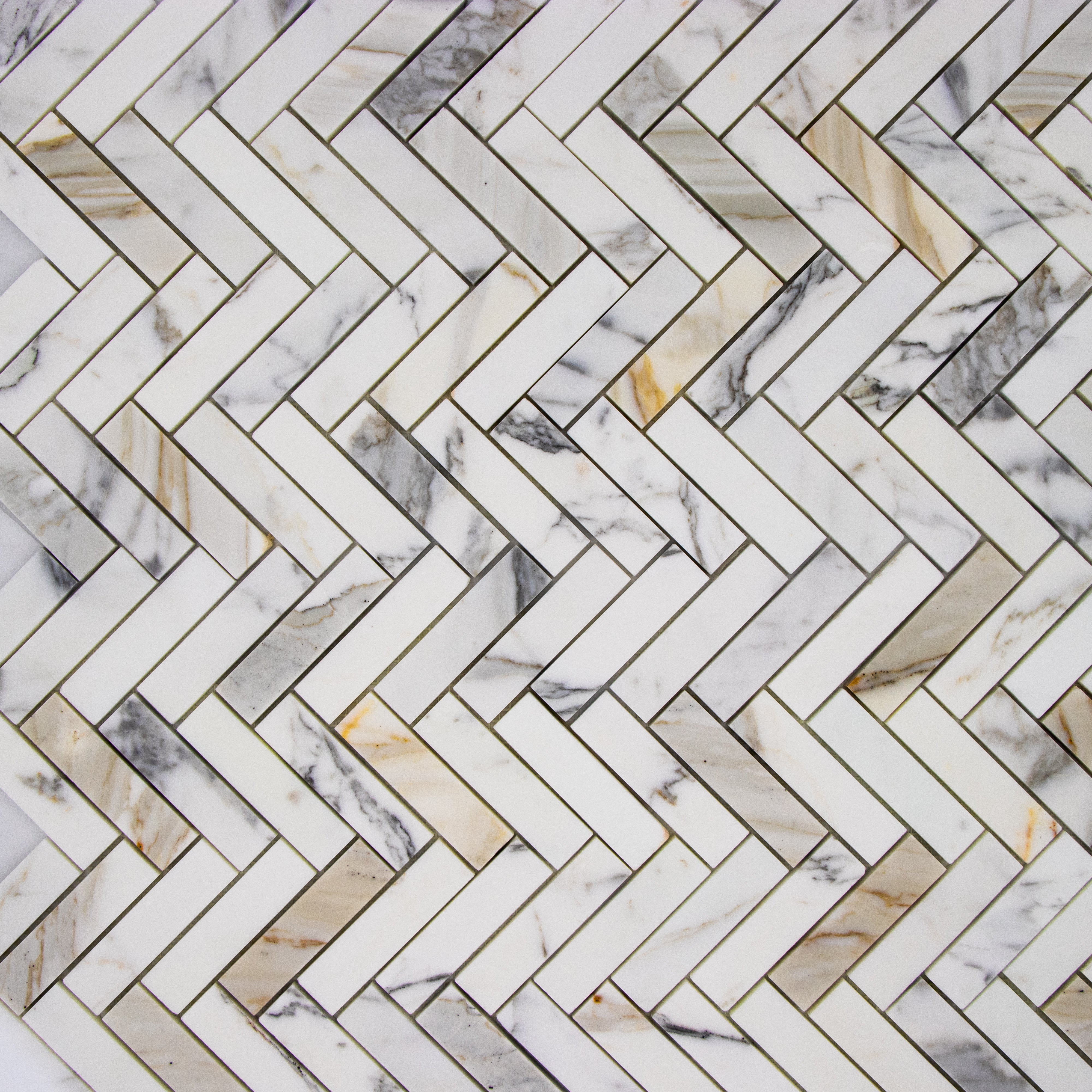 Calacatta Gold Marble Herringbone 1"x4" Mosaic