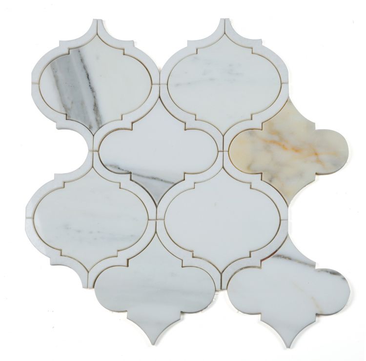 Alice Precious Calacatta tile with elegant white marble and gold veining.