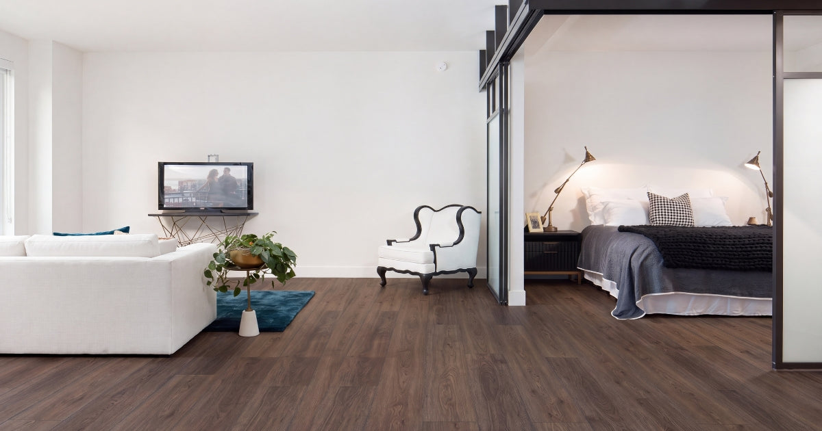 Bedroom tile idea: Helsinki Encina 10 x 60 - honey oak bedroom flooring in a styled bedroom