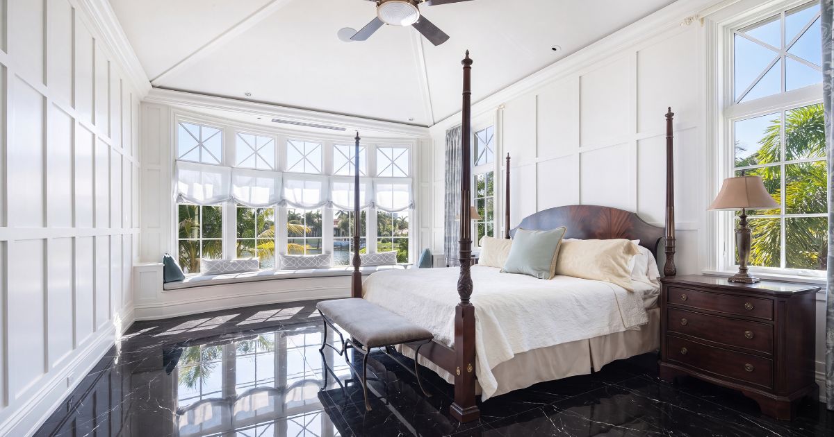 Bedroom tile idea: Classici Marquinia Glossy 32 x 32 - black marble look bedroom floor in a styled bedroom
