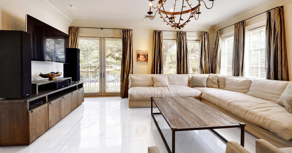 Living room tile idea: Marshall Blue Polished 24 x 48 - bold blue statement floor tile in a styled living room