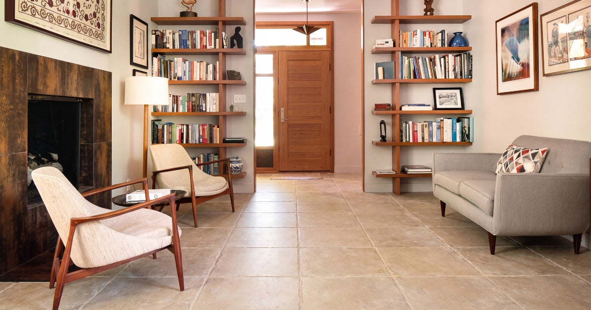 Living room tile idea: Ostuni Sabbia 16 x 16 - warm sandy stone look tile in a styled living room