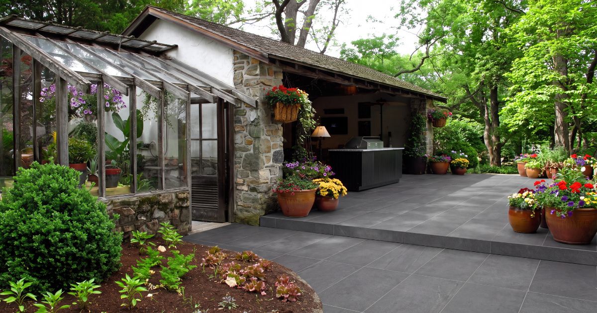 Patio tile idea: Core Plumb 30 x 60 - concrete-look patio floor tile in a styled outdoor patio