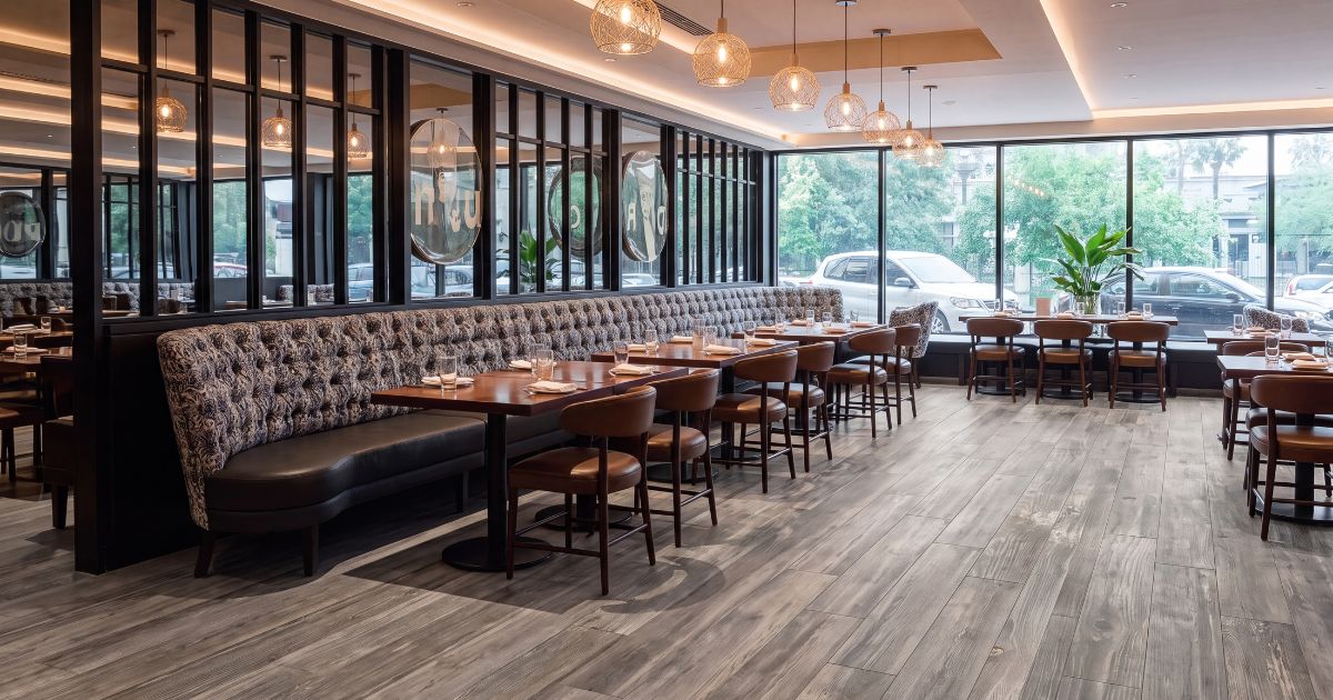 Restaurant and retail tile idea: Artwood Dovegrey 10.5 x 71 - oversized wood-look restaurant tiles 2026 in a commercial space