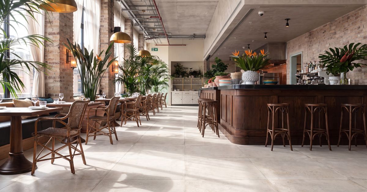Restaurant and retail tile idea: HLC Alchimia 10 - Bianco 48 x 48 - white porcelain restaurant floor tile ideas in a commercial space