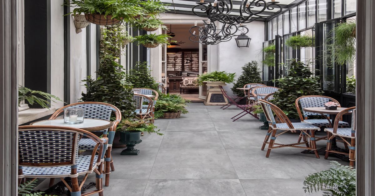 Restaurant and retail tile idea: Plain Cinder 48 x 48 - industrial concrete-look retail tile designs in a commercial space