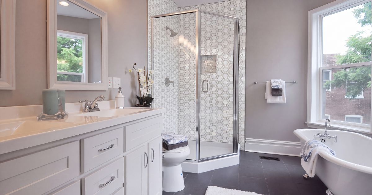 Shower tile idea: Aether Diana 11.5 x 12 - geometric marble mosaic shower accent in a styled shower