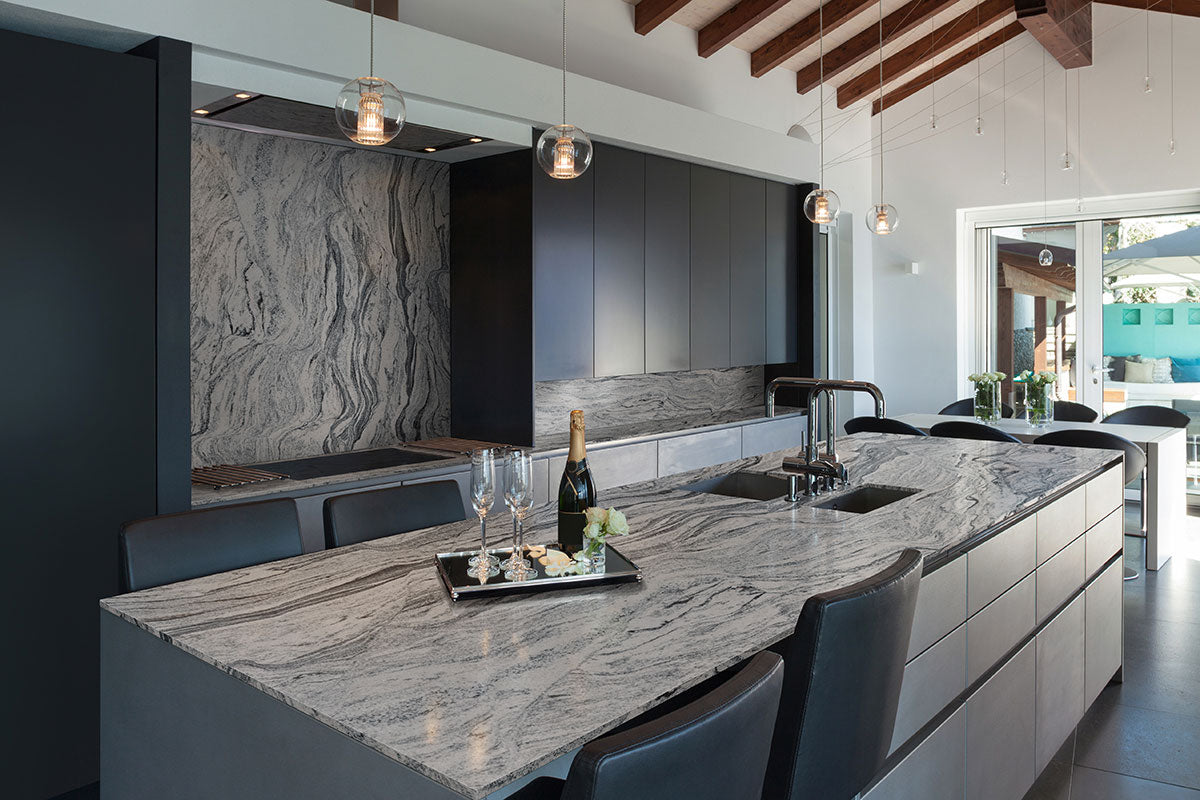Silver Cloud grey stone kitchen island installation